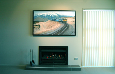 The original, 'TranzAlpine Journey' by Grant McSherry is a large size oil painting, finished in a hand crafted, black lacquer shadow frame with negative space.